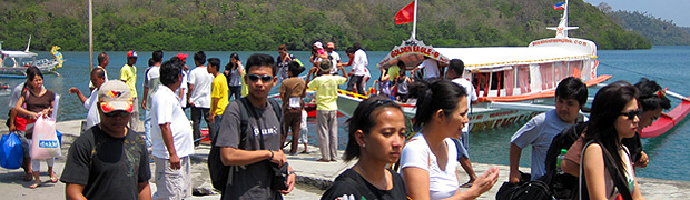 photograph passengers disembarking from ferry Golden Eagle-G at Muelle Pier Puerto Galera